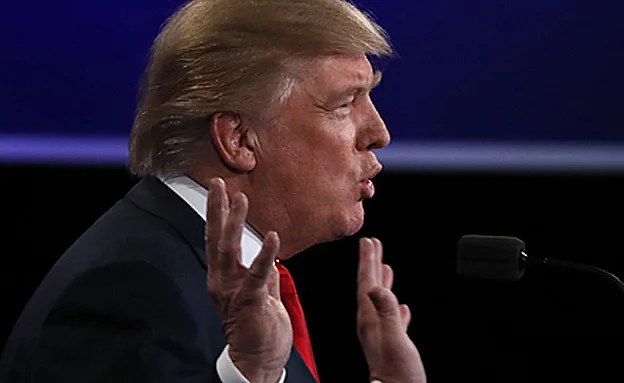 ''אובמה כובל את טראמפ'' (רויטרס)