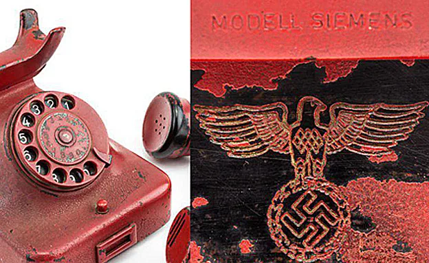 שמו של הצורר וצלב הקרב נחרתו על הטלפון