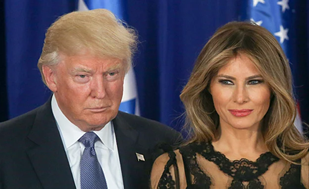 הנשיא טראמפ ורעייתו. היום (Marc Israel Sellem/POOL פלאש 90)