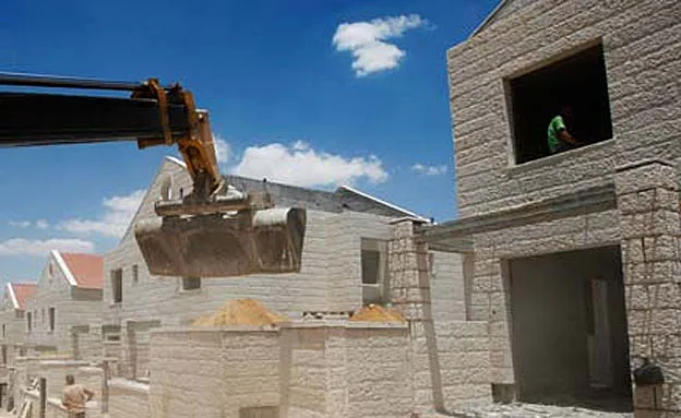 ''הפרת החוק הבינלאומי''. בנייה בהתנחלויות (רויטרס)