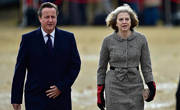 זו שבאה וזה שהלך. קמרון ומיי (רויטרס)