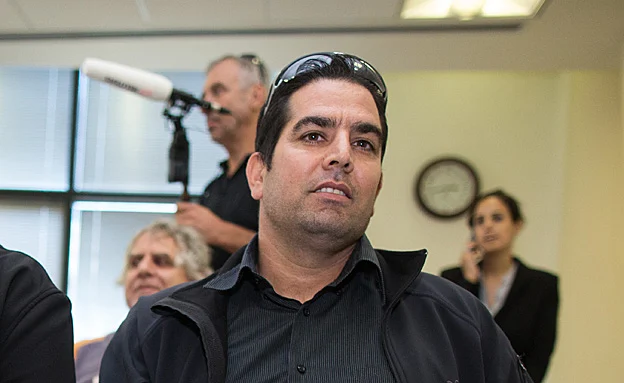 עוכב לחקירה. מני נפתלי (יונתן סינדל, פלאש 90)