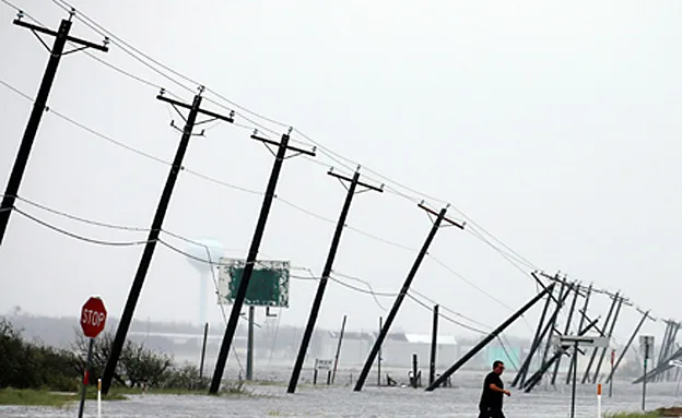 אלפי חולצו מהשיטפון (רויטרס)