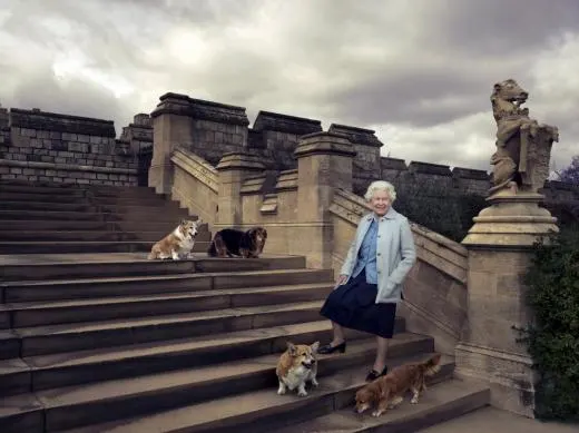 Britain's Queen Elizabeth II is seen walking in the private grounds of Windsor Castle on steps at the rear of the East Terrace and East Garden with four of her dogs