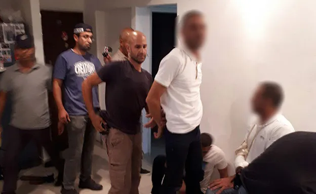 החשודים בדירת המסתור (דוברות המשטרה)