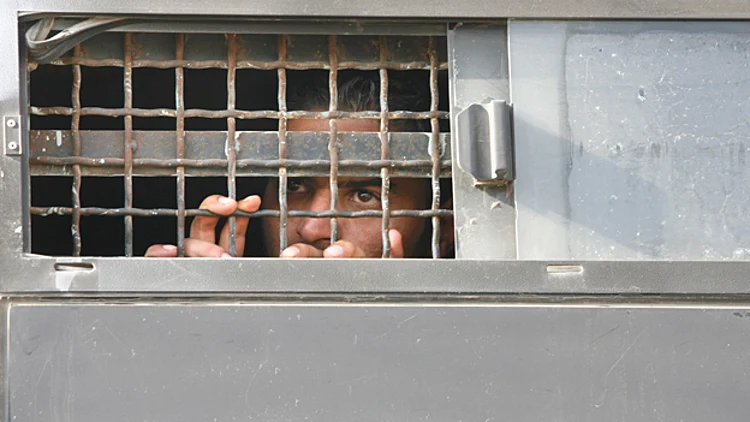 אסיר, ביטחוני, כלא, פלסטיני, סורגים, מעצר, עצור. אילוסטרציה