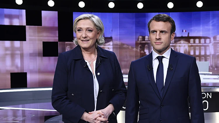 עמנואל מקרון ומארין לה פן, המועמדים לנשיאות צרפת