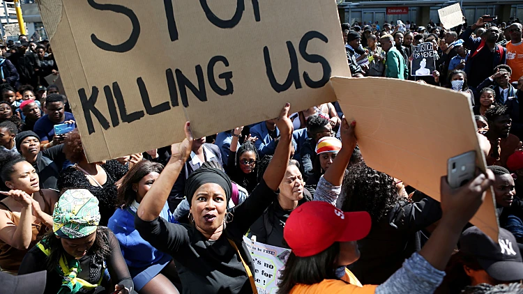 Demonstrators Gather Outside The Cape Town International Convention Centre During A Protest Against Gender Based Violence, At The World Economic Forum On Africa