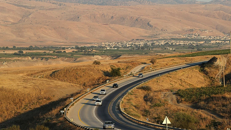Vehicles Drive Through A Road In Jordan Valley, The Eastern Most Part Of The Israeli Occupied West Bank That Borders Jordan