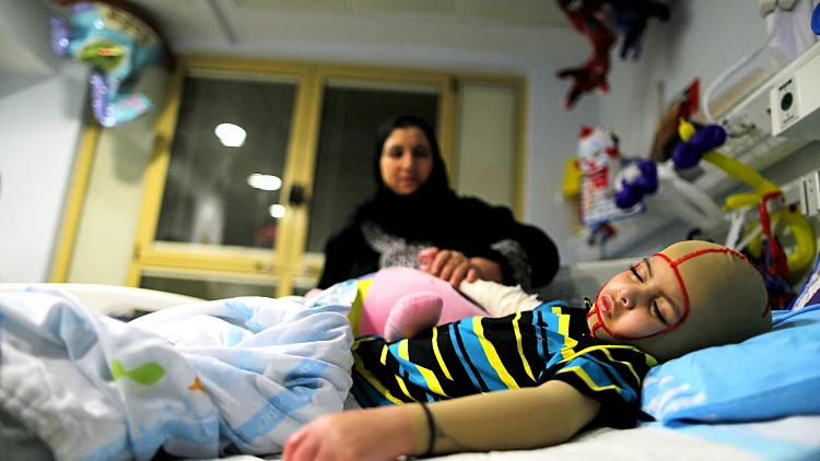 אחמד דוואבשה, שמשפחתו נספתה בהצתת ביתם, בבית החולים