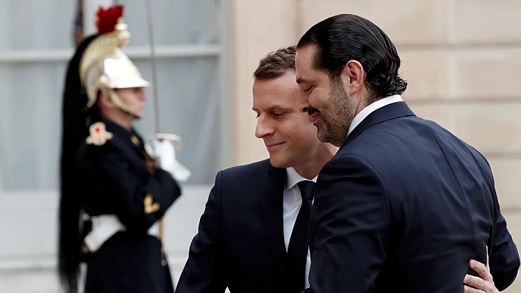 סעד אל-חרירי ועמנואל מקרון בארמון האליזה בפריז