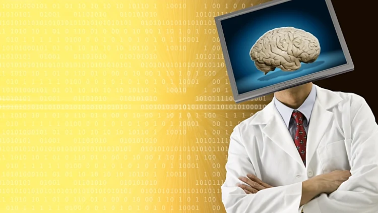 מסך מחשב עם תמונה של מוח מחליף את ראשו של אדם