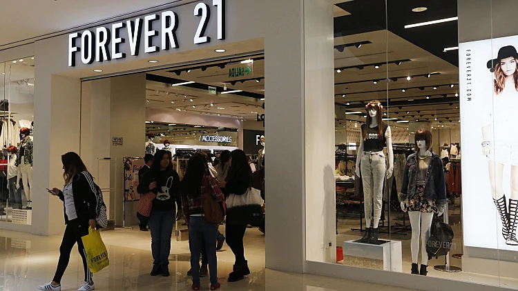 Customers Walk And Stand Outside The First Forever 21 Retail Store In Lima, At Real Plaza Salaverry Shopping Mall