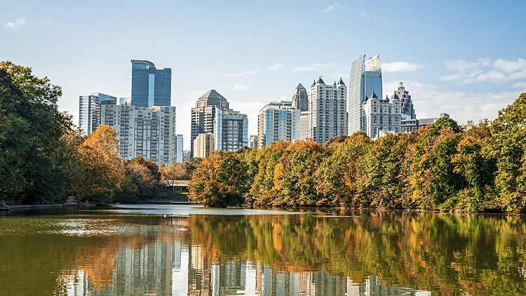 Reflection Of Buildings In Lake