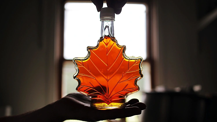 Jim Lattanzi, Owner Of Hollis Hills Farm, Holds Up A Bottle Of His Maple Syrup At The Farm In Lunenburg