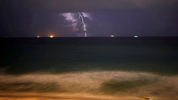 Lightning Strikes Over The Mediterranean Sea During A Rain Storm Near The City Of Ashkelon
