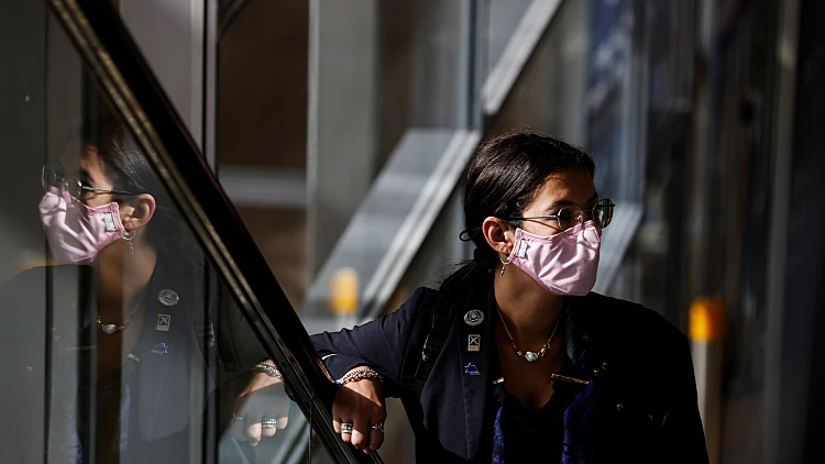 A Woman Uses The Escalator At Ben Gurion International Airport As Israel Imposes New Coronavirus Disease (covid 19) Restrictions