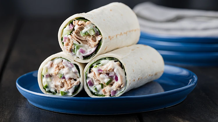 Tuna,burritos,with,cucumber,red,onion,and,mayonnaise,on,rustic