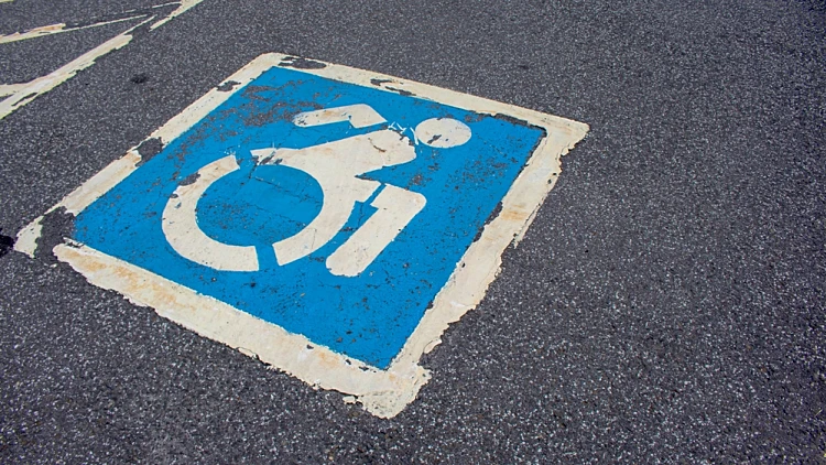 Parking,stret,side,for,handycaped,people,wheelchair,figure,icon,blue