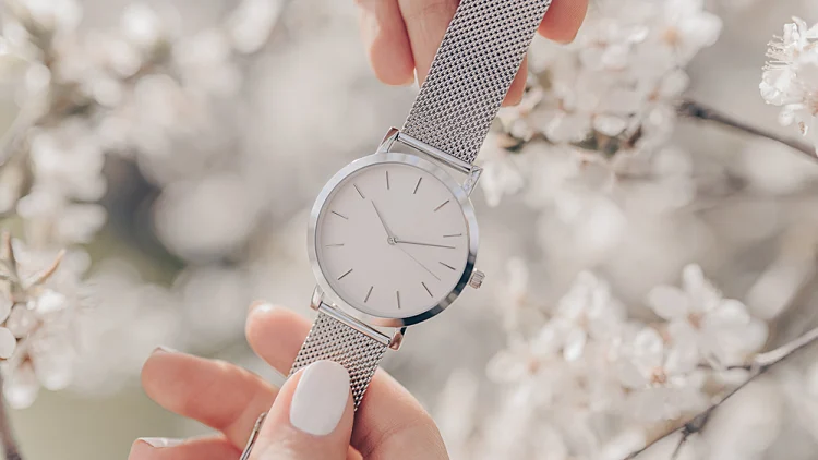 Stylish,white,watch,in,woman,hands