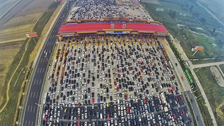 Vehicles Are Seen Stuck In A Traffic Jam Near A Toll Station As People Return Home At The End Of A Week Long National Day Holiday, In Beijing