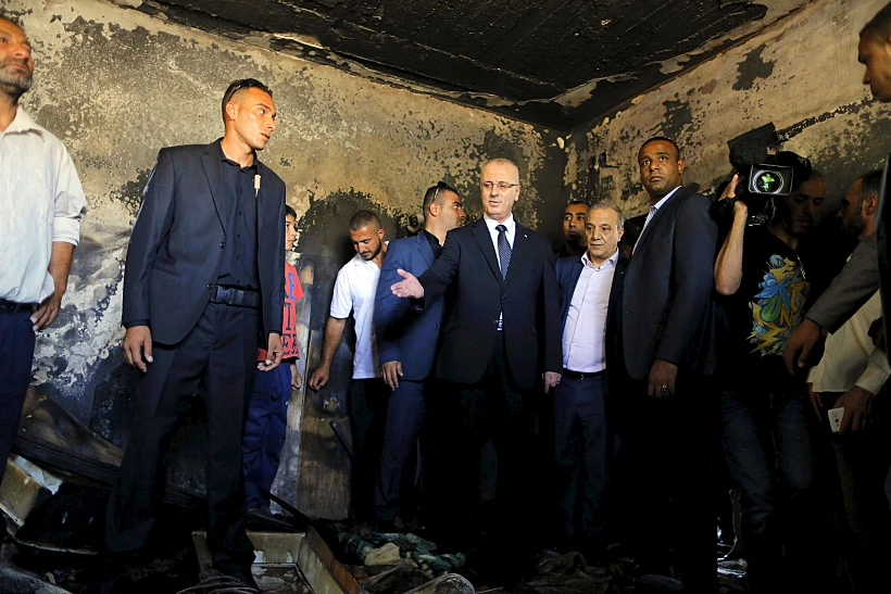 ראש הממשלה הפלסטיני בבית שהוצת בדומא