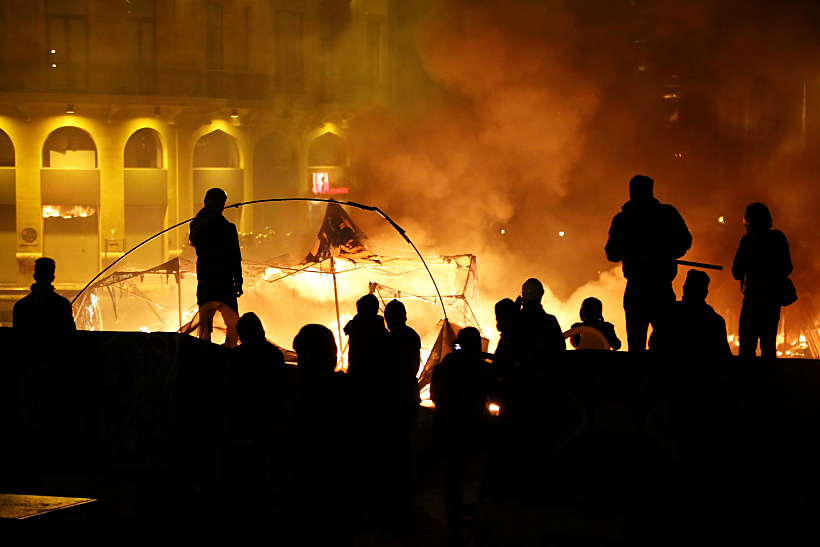Protesters Stand Near Burning Tents During Anti Government Protests In Beirut