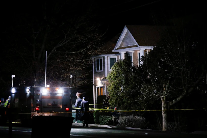 Jewish People Walk In Front Of The House Where 5 People Were Stabbed At A Hasidic Rabbi's Home In Monsey, New York
