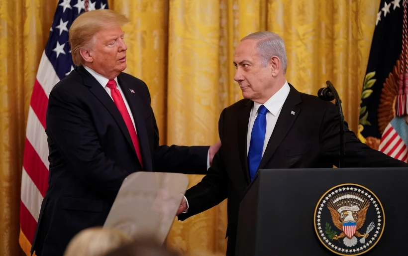 U.s. President Trump And Israel's Prime Minister Netanyahu Shake Hands Announcing Middle East Peace Proposal At News Conference At White House In Washington