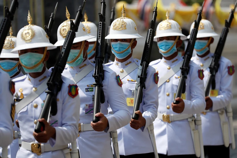 Thai Royal Guards Wear Masks Inside The Royal Palace In Bangkok