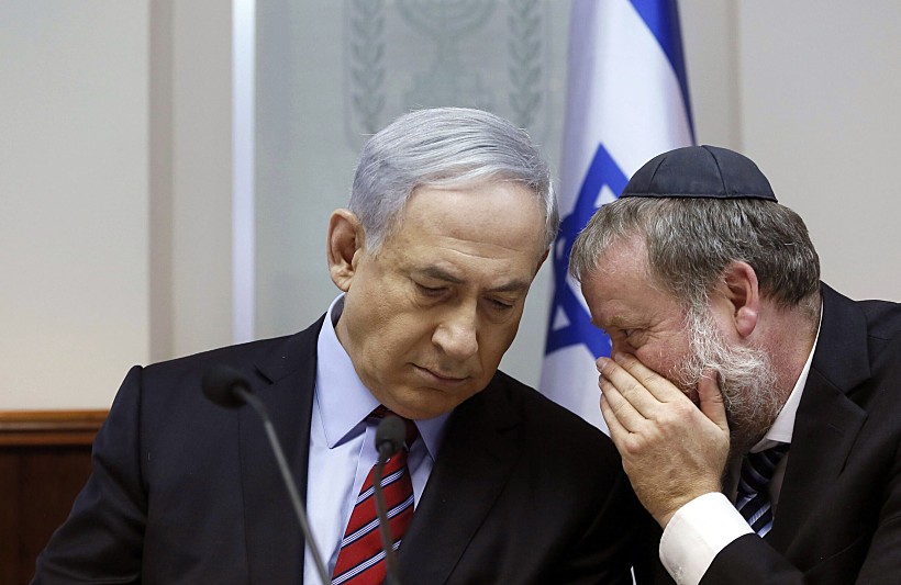 Israel's Prime Minister Netanyahu Listens To Cabinet Secretary In Jerusalem