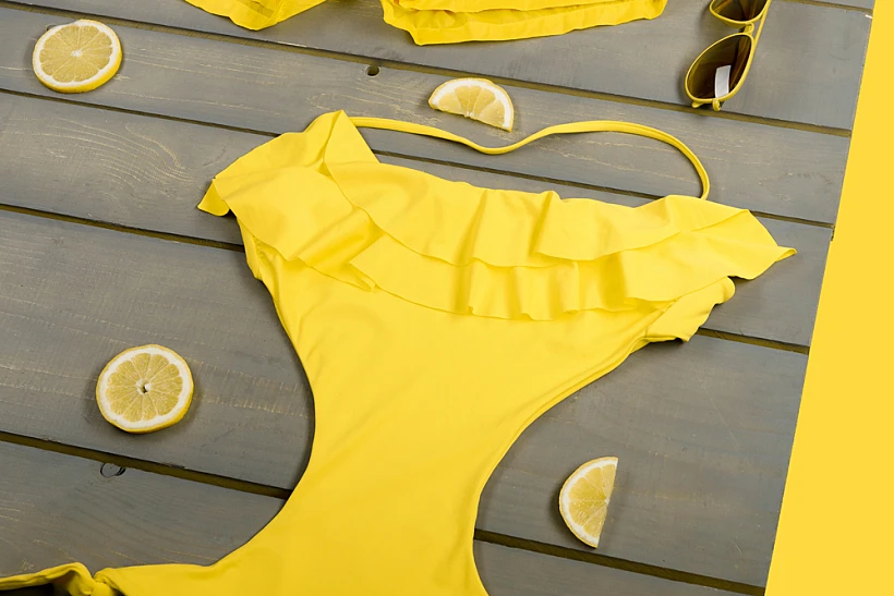 Yellow,swimwear,one Piece,,swim,shorts,,aviator,sunglasses,,lemon,on,grey