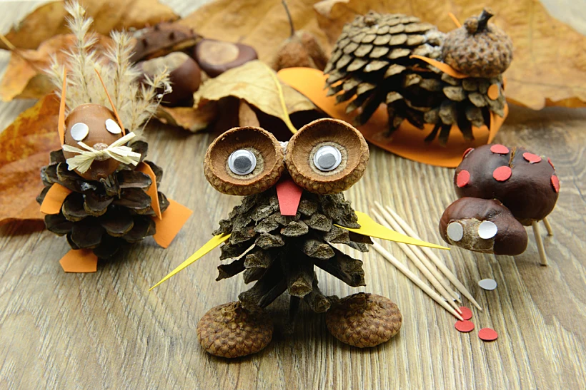 Tinker,small,owl,,squirrel,figure,snail,and,ladybug,made,of,pine