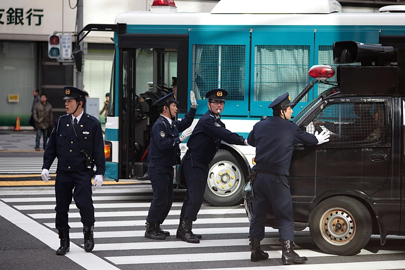 Tokyo, ,march,11:,police,stopping,right Wing,protesters,near,the