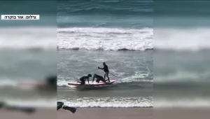במהלך בילוי בחוף רוי מבחין בזוג גולשים נסחף - החליט לקפוץ למים ולהציל את חייהם