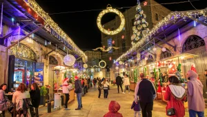 קפיצה לחו"ל מבלי להחתים דרכון - ירושלים נצבעת לחג המולד