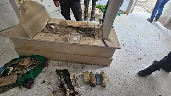 תיעוד: M-16 ומחסניות התגלו בקבר בנצרת, חשוד נעצר