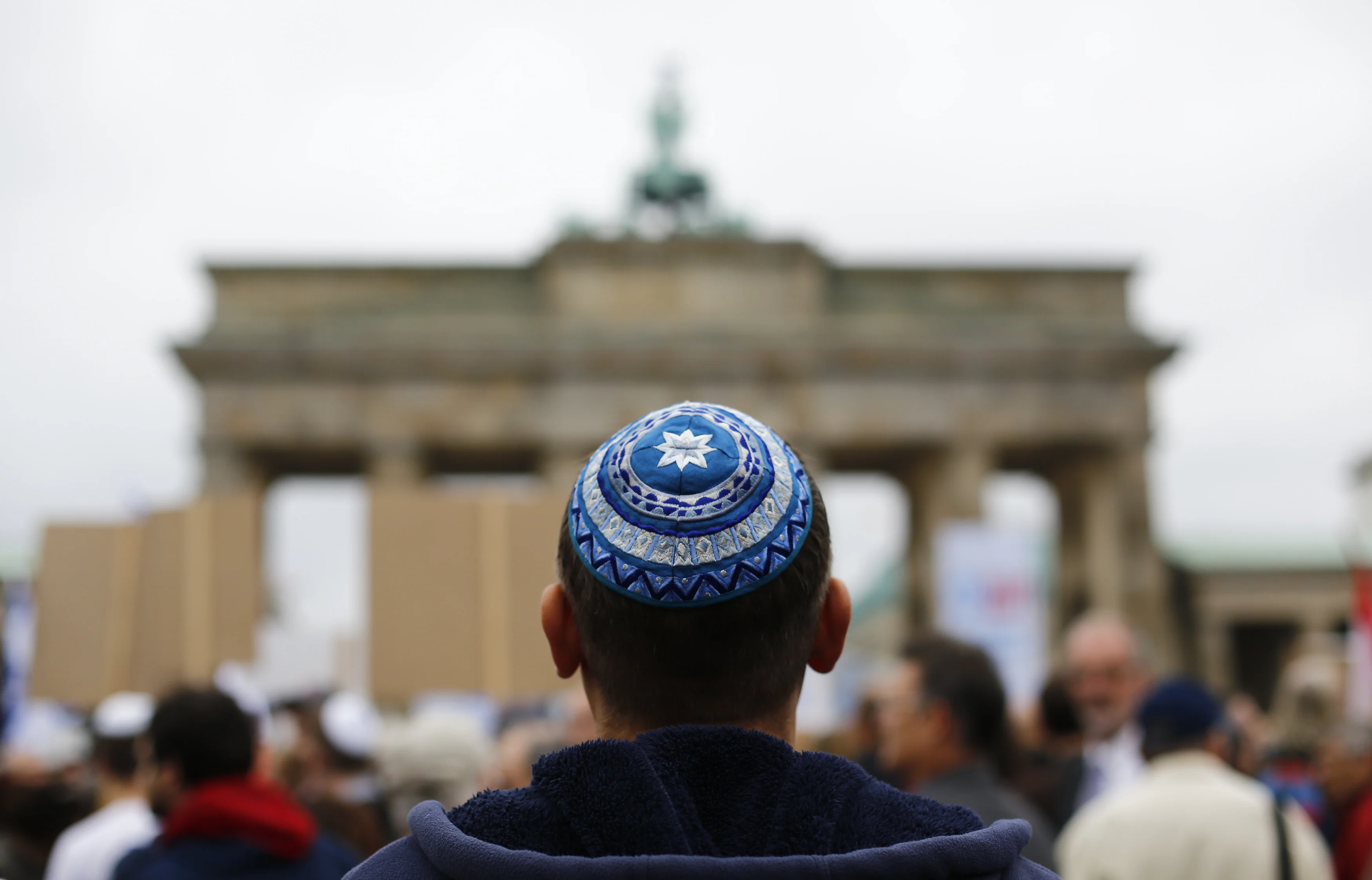 A Man Wearing A Kippah Waits For The Start Of An Anti Semitism Demo At Berlin's Brandenburg Gate