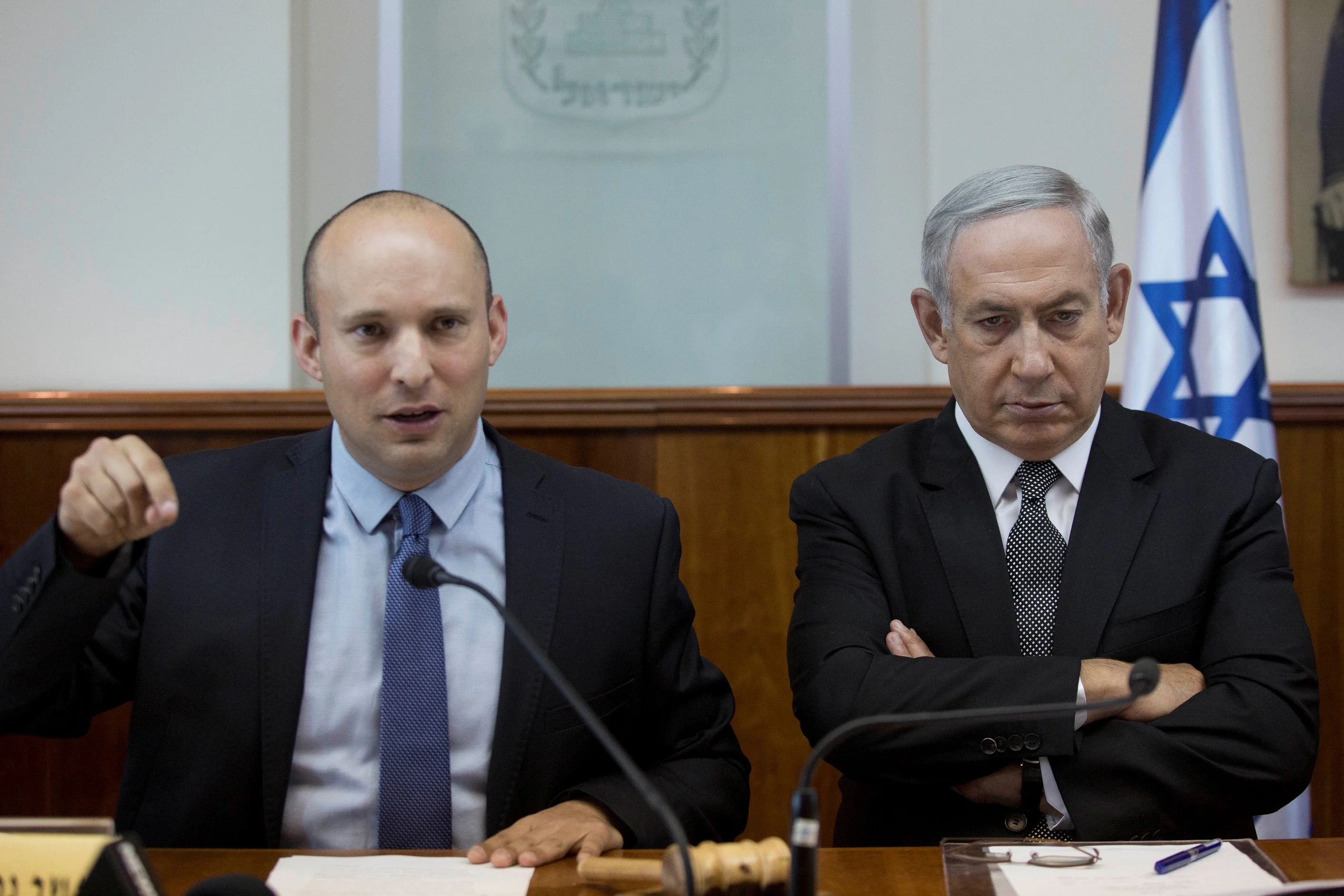 Israeli Pm Netanyahu Sits Next To Education Minister Naftali Bennett During The Weekly Cabinet Meeting At His Office In Jerusalem