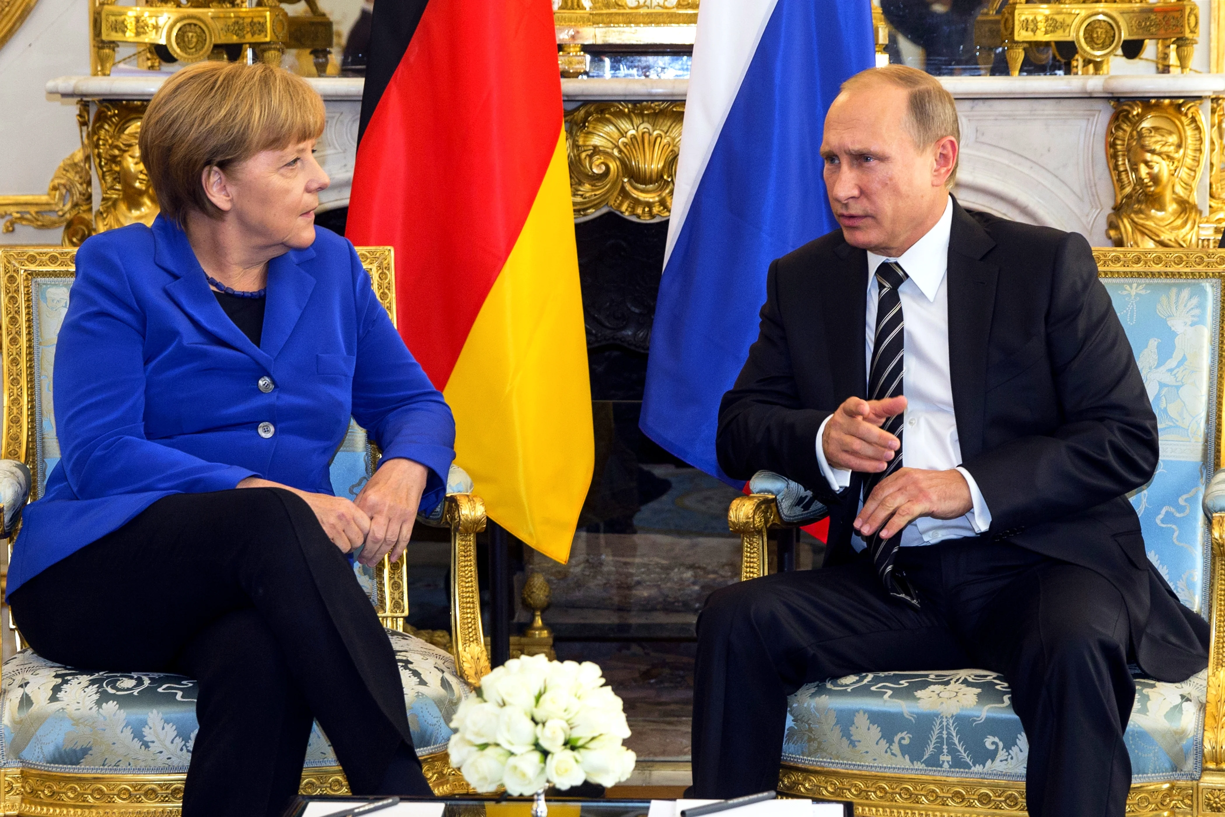 נשיא רוסיה פוטין בפגישה עם קנצלרית גרמניה מרקל