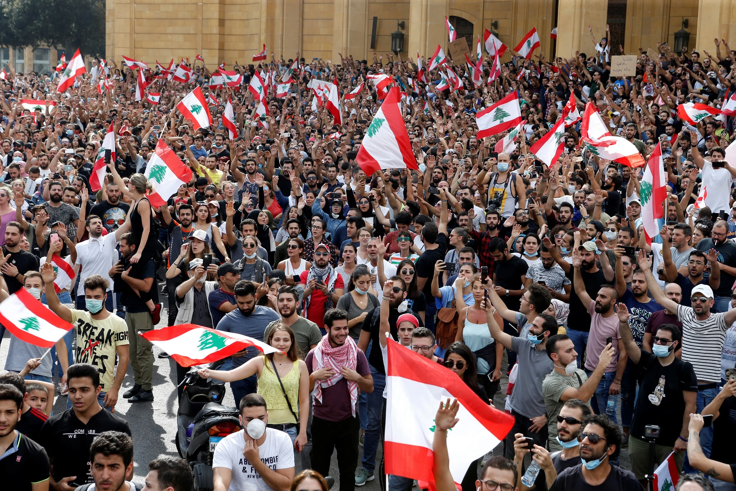 Demonstrators Hold Lebanese Flags As They Gather During A Protest Over Deteriorating Economic Situation, In Beirut