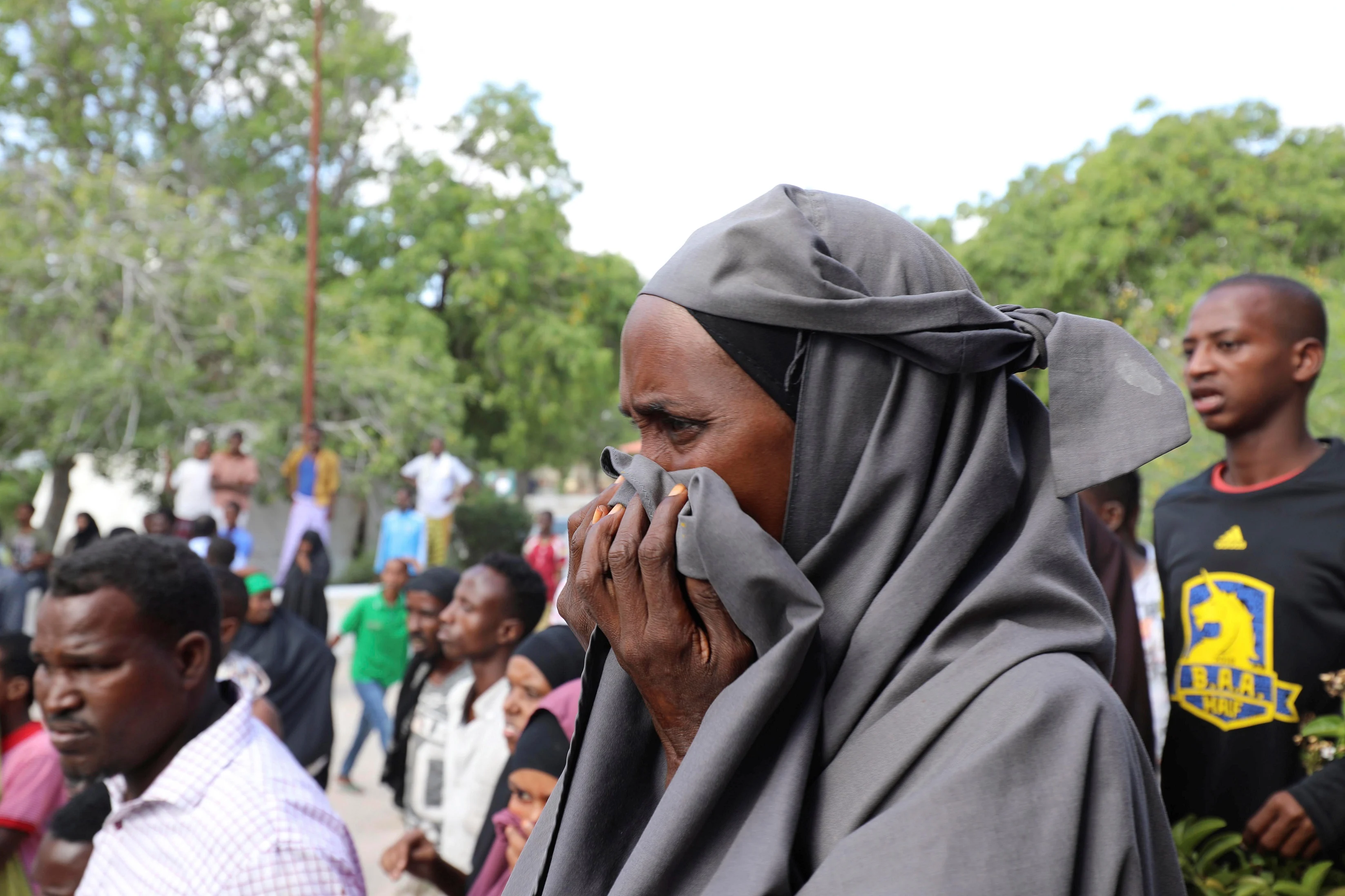 A Somali Woman Reacts At The Scene Of A Car Bomb Explosion At A Checkpoint In Mogadishu