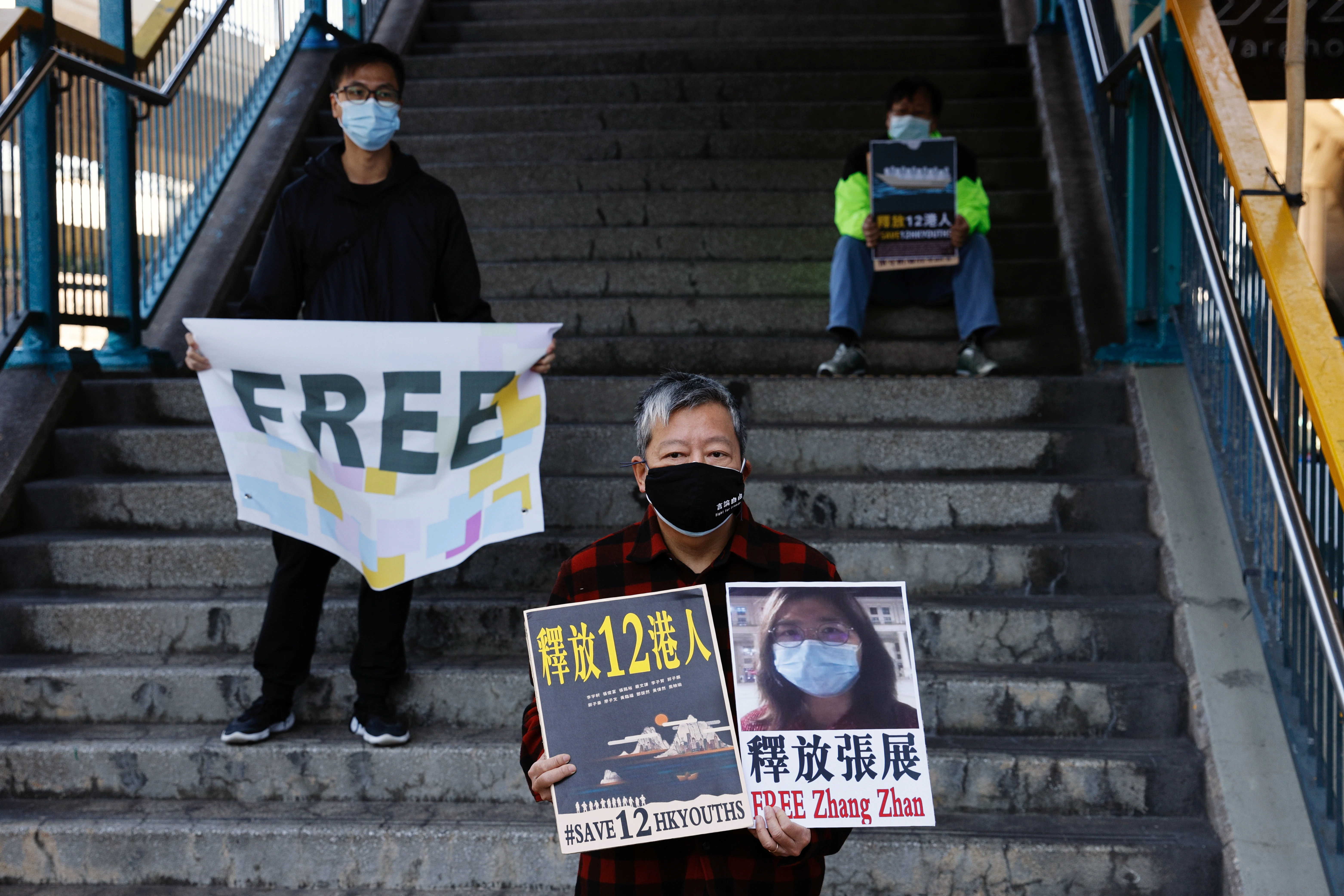 הפגנה בהונג קונג למען שחרורה של ז'אנג יחד עם פעילים נוספים