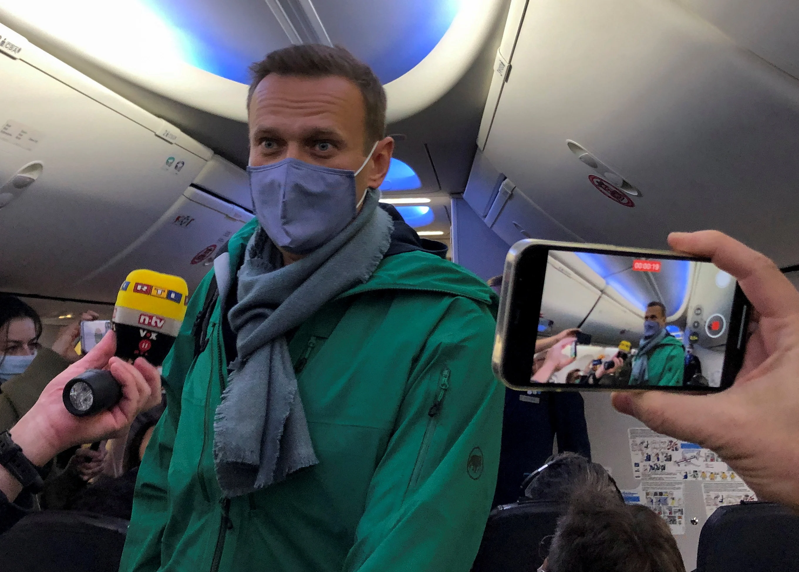 Russian Opposition Leader Alexei Navalny Is Seen On Board A Plane Before The Departure For Moscow At An Airport In Berlin