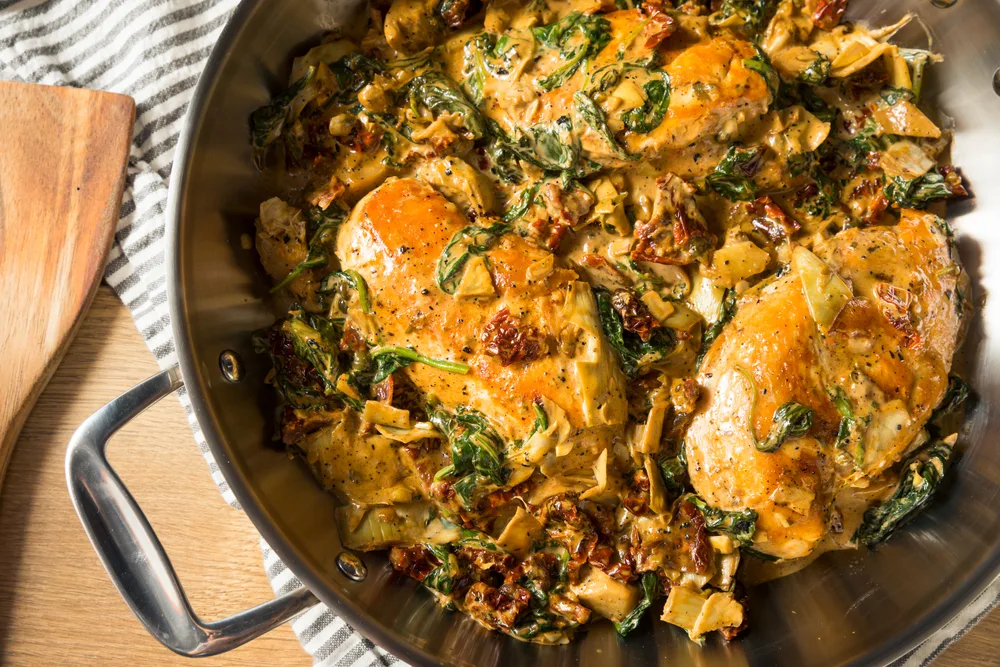 Homemade,creamy,italian,tuscan,chicken,with,spinach,and,pasta