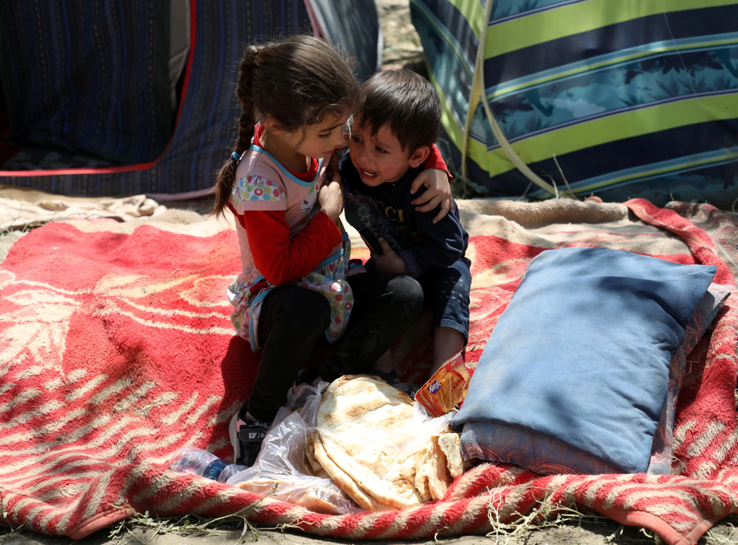 ילדים מחנה פליטים אפגניסטן טליבאן
