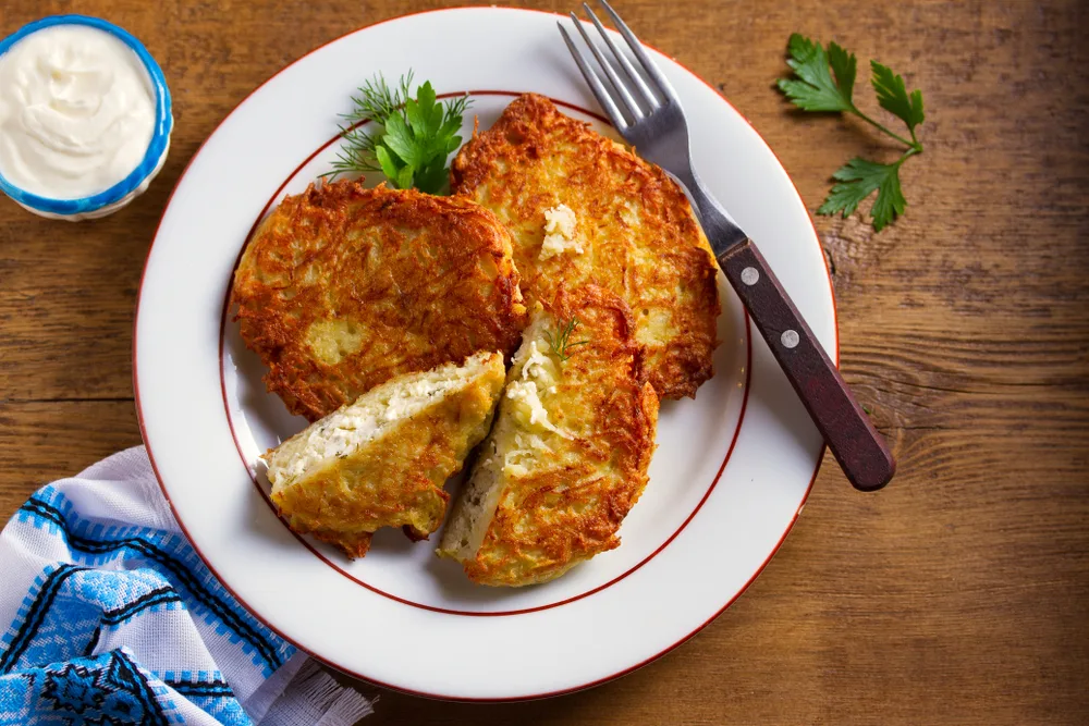 Potato,pancakes,filled,with,cheese.,vegetable,fritters,stuffed,with,cottage