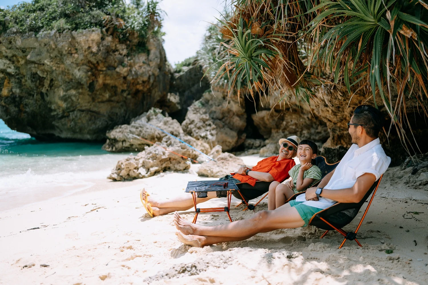 Three Generation Family Enjoying Beach Campsite, Okinawa, Japan