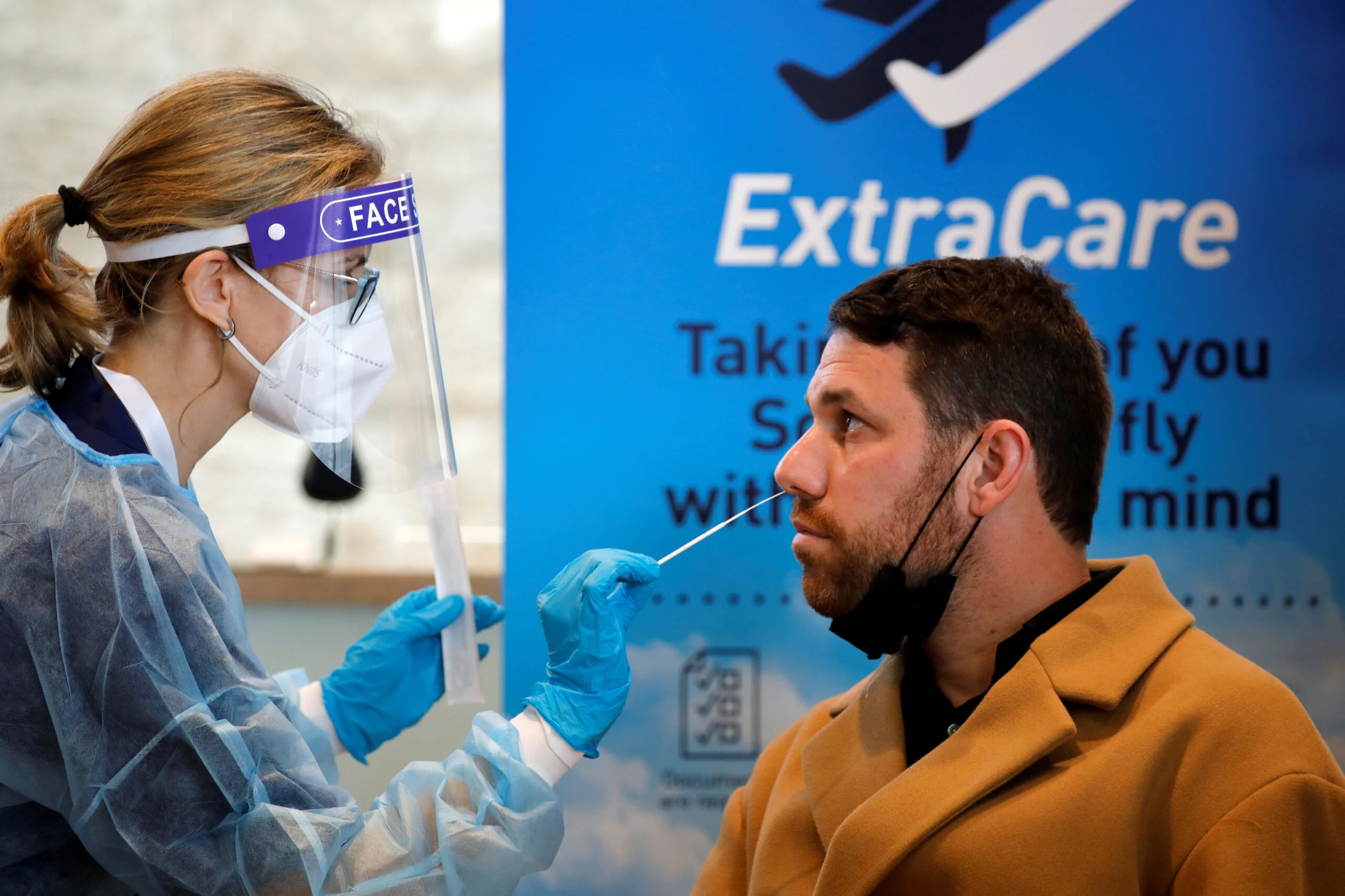 A Health Worker Takes The Antigen Test Which Takes 15 Minutes To Deliver Results And Is Considered Reliable For Detecting Active Coronavirus Disease (covid 19) Infection, An El Al Spokesman Said, At Ben Gurion International Airport In Lod