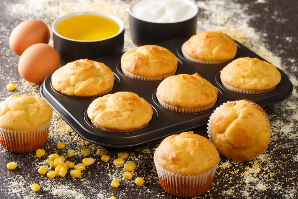 Healthy,corn,muffins,in,a,baking,dish,and,ingredients,close Up